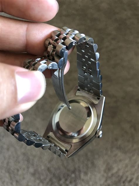 how to open Rolex band